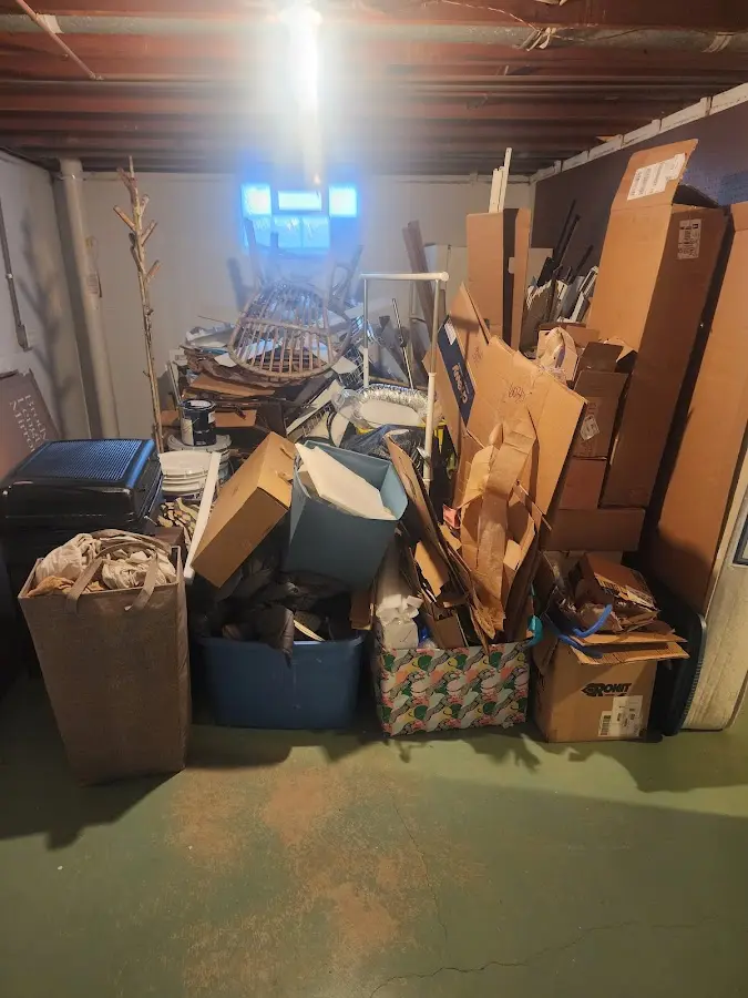 Roll-off dumpster container at job site for 2 Yard Dumpster Rental in Newcastle